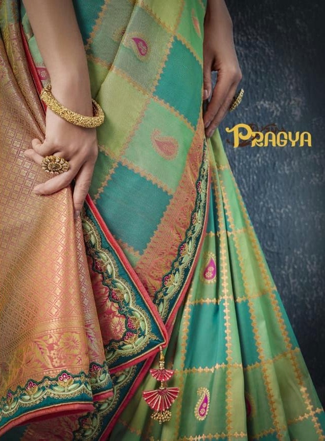 Pragya saree 7001-7012 partywear heavy work silk saree catalogue from surat wholesaler