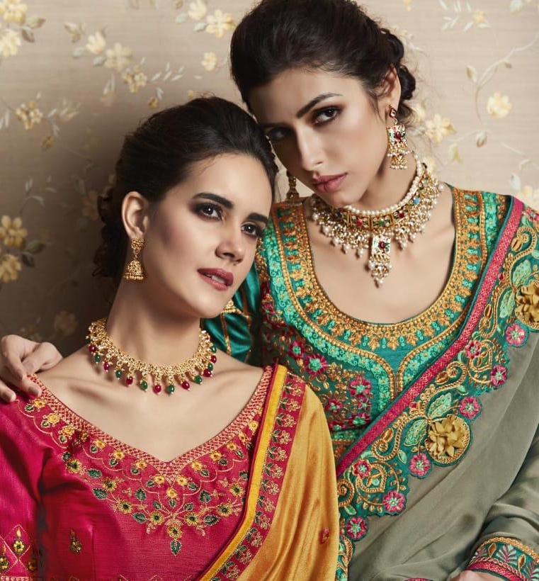 Kessi fabrics utsav fancy party wear silk geogertte saree catalogue from surat wholesaler